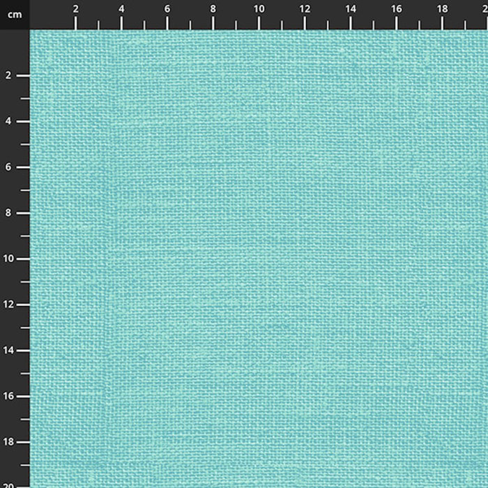 Teal fabric swatch with a grid for measurement