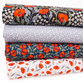Four folded fat quarters stacked vertically, each featuring a floral pattern. The top roll has large orange poppy flowers on a black background with white and green foliage.
