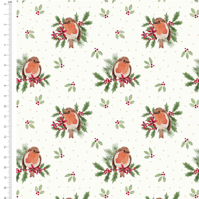 A repeating Christmas-themed pattern on a warm off-white cotton fabric, featuring robin birds in orange and brown, green holly leaves and branches, small red berries, and tiny gold polka dots. A cm ruler is visible along the left edge.