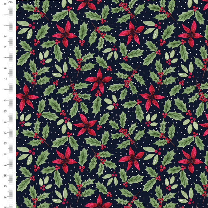 A repeating Christmas holly and poinsettia pattern on a dark navy background, shown with a cm ruler along the left edge for scale. The design features green holly leaves, red berries, and red poinsettia flowers with small white dots throughout.