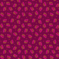 Patterned cotton quilting fabric with pink and gold design on a purple background