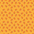 Patterned cotton quilting fabric with floral design on a yellow background