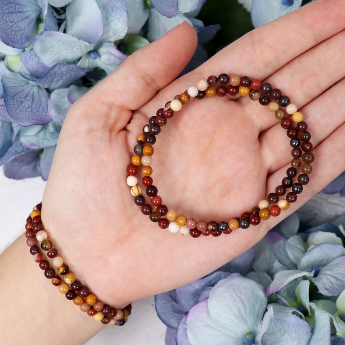 Close-up of natural Mookaite Jasper beads showing colour and pattern