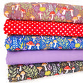 A fat quarter bundle with mushroom prints in vibrant colours