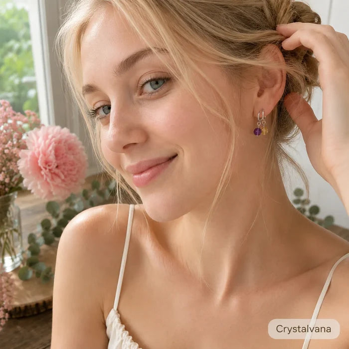 Model wearing amethyst and citrine dangle earrings neck close-up portrait, Crystalvana