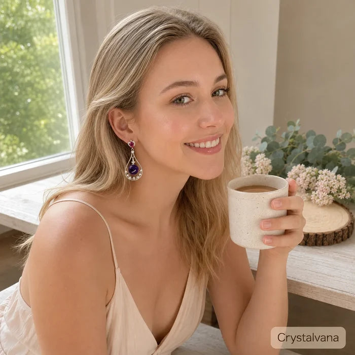 Model wearing natural amethyst halo teardrop earrings blonde holding coffee mug portrait, Crystalvana