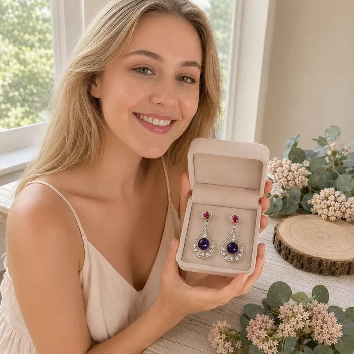 Model holding beige gift box with natural amethyst halo teardrop earrings presentation, Crystalvana