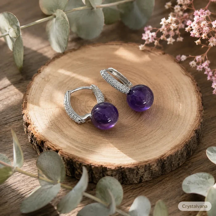 Natural amethyst S925 silver dangle earrings close-up on branch nature background, Crystalvana