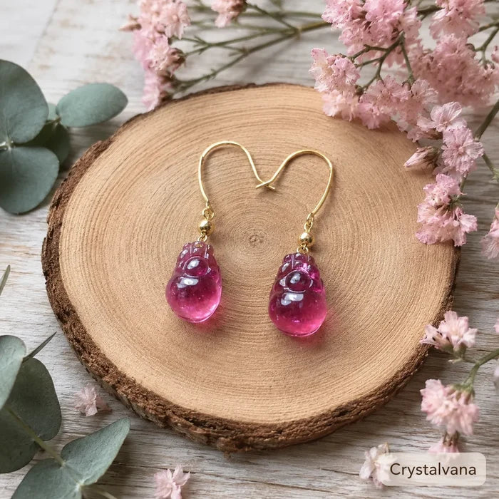 Model wearing natural red tourmaline rubellite earrings blonde ear close-up side profile, Crystalvana