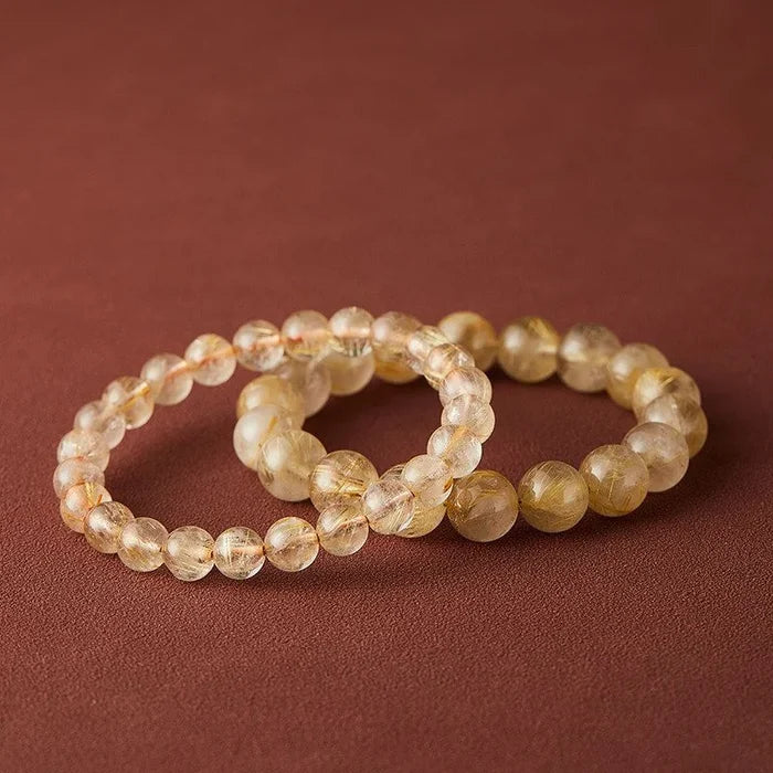 Natural Rutilated Quartz crystal bracelet with golden inclusions for manifestation, Crystalvana