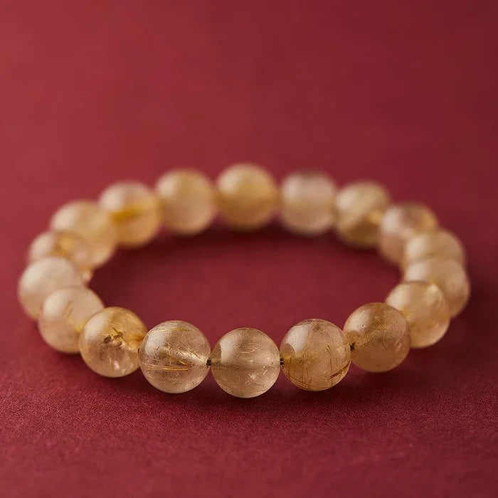 Natural Rutilated Quartz crystal bracelet with golden inclusions for manifestation, Crystalvana