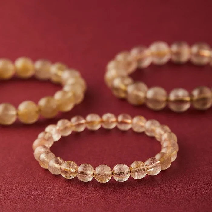 Natural Rutilated Quartz crystal bracelet with golden inclusions for manifestation, Crystalvana