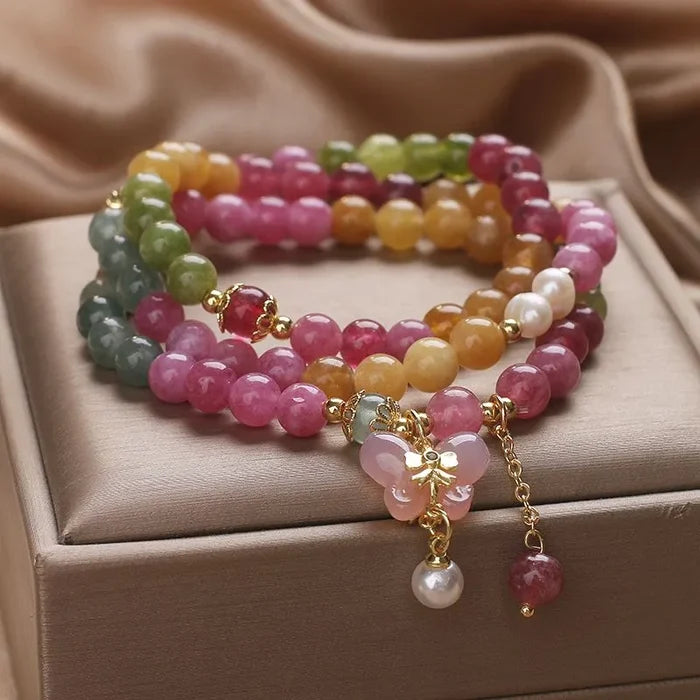 Tourmaline bracelet styled on model wrist — healing crystal bracelet for positive energy by Crystalvana