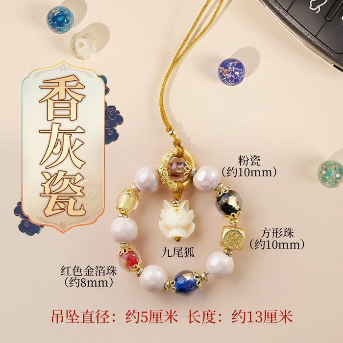 Fox phone charm lifestyle shot on phone - crystal phone charm for protection by Crystalvana
