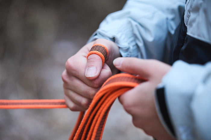 Lifestyle image of the Friction Long Line, with hands holding the length of the line.