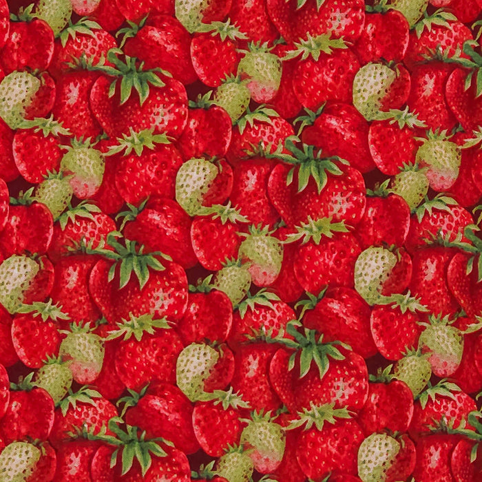 Pattern of red strawberries with green leaves on a fabric cotton quilting fabric