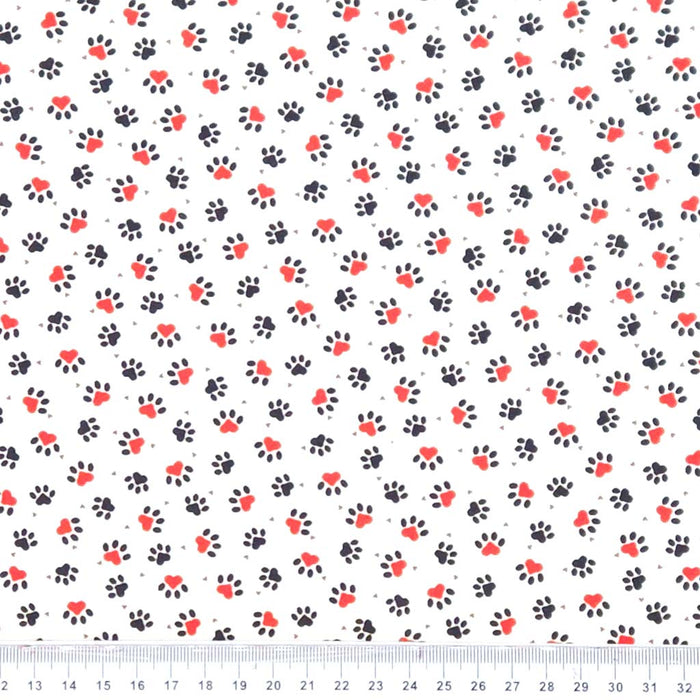 Pattern of black and red paw prints on a white background