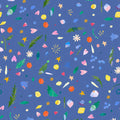 Colourful pattern of flowers, leaves, and abstract shapes on a blue cotton quilting fabric