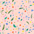 Colourful pattern of leaves and flowers on a pink cotton quilting fabric