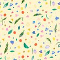 Colourful pattern of leaves, flowers, and abstract shapes on a yellow cotton quilting fabric