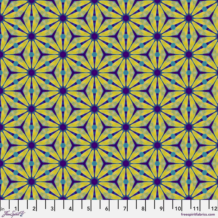 Geometric pattern with yellow and purple shapes on a cotton quilting fabric