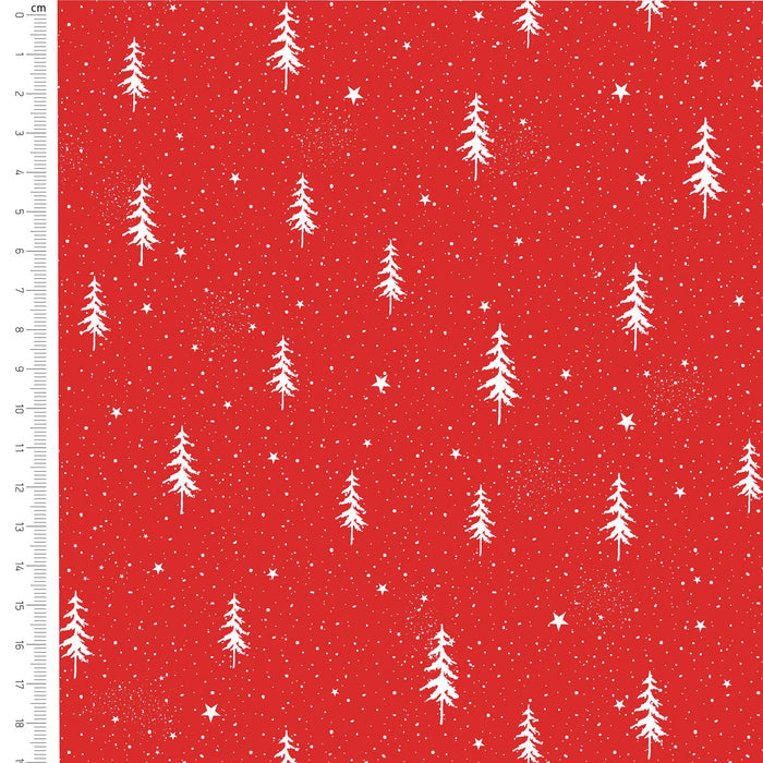 Red fabric with a white Christmas tree and snowflake pattern, featuring a white ruler on the left side showing the scale of the print.