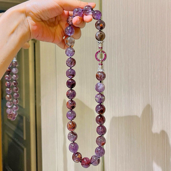 Purple phantom quartz beads detail one