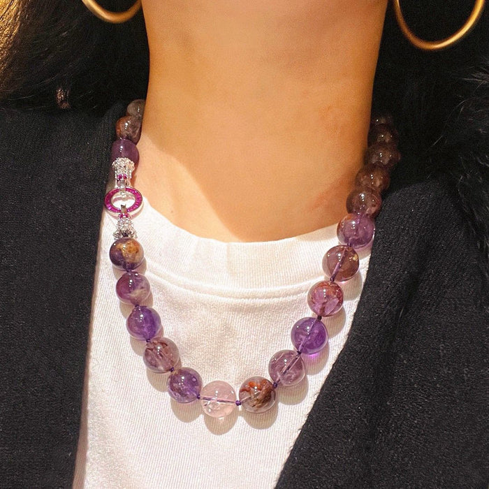 Purple phantom quartz necklace on model