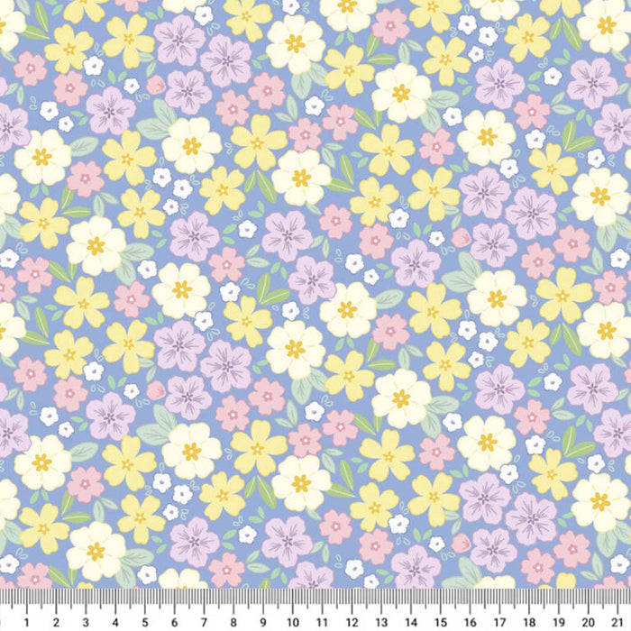 Pastel floral pattern on a blue cotton quilting fabric