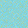 Geometric pattern with blue and green colorus on a blue quilting cotton fabric