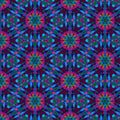 A geometric pattern with pinks and blues, printed on a cotton quilting fabric