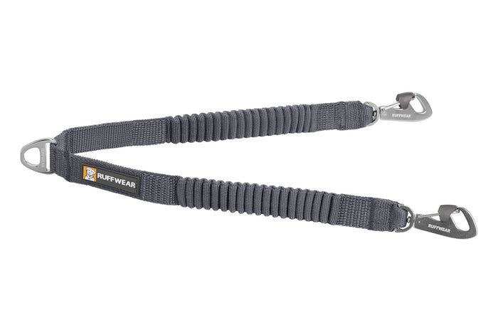 Stock image of the Ruffwear Double Track Coupler, a grey bungee coupler on a white background.