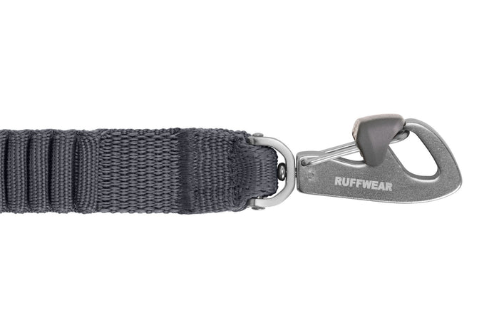 Stock image of the Ruffwear Double Track Coupler clip, a grey bungee coupler on a white background.