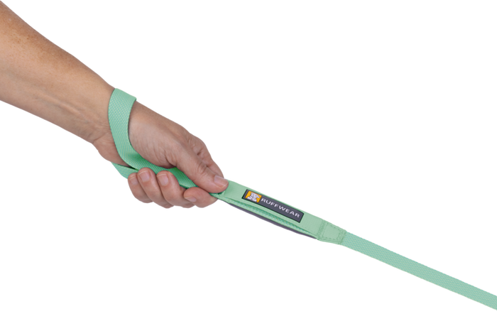 Stock image of the Hi & Light Lead being held by a hand, with Ruffwear branding.