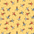 Pattern of scarecrows and wheat on a yellow cotton quilting fabric