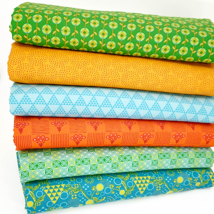 A fat quarter bundle of vribrantly coloured geometric quilting prints