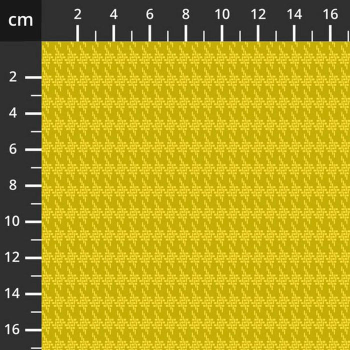 Yellow fabric with a textured pattern and a ruler on the top left corner for scale.