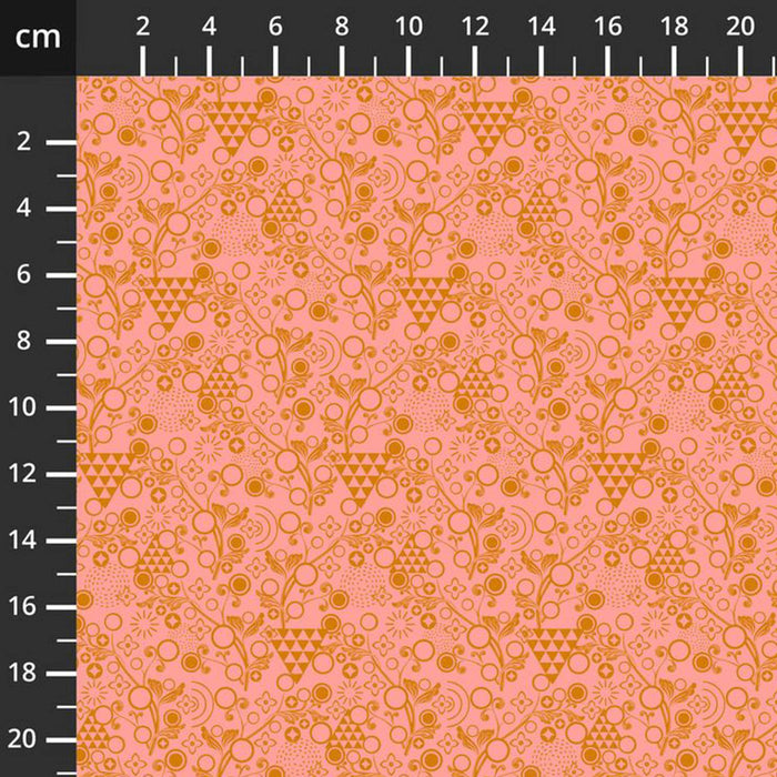 Pink fabric with orange geometric pattern and measurement scale on the side