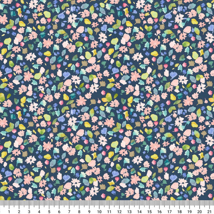 Floral pattern fabric with a ruler at the bottom for scale.