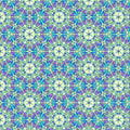 A geometric pattern in purples and greens printed on a cotton quilting fabric