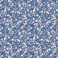 Small floral pattern on a blue cotton quilting fabric