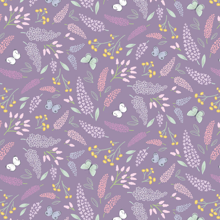 Butterflies printed on a lilac cotton quilting fabric