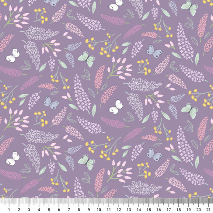 Butterflies printed on a lilac cotton quilting fabric with a cm ruler