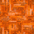 A close-up of an orange Halloween-themed cotton fabric featuring repeated black and yellow text such as 'Spooky', 'Happy Halloween', 'Boo!', 'Stay Spooky', and 'Trick or Treat'.