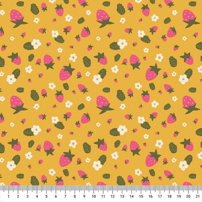 Strawberries printed on a cotton quilting fabric with a cm ruler