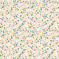 Pattern of small flowers and leaves on a light pink cotton quilting fabric