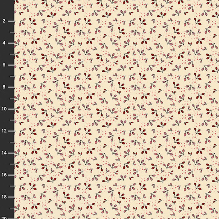 Floral patterned cotton quilting fabric with small red and purple flowers on a beige background