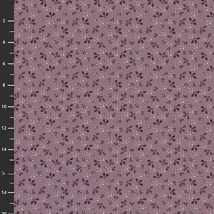 Floral patterned fabric swatch on a purple background