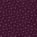 Pattern of small flowers on a dark purple cotton quilting fabric