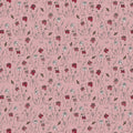 Floral pattern with red, white, and black flowers on a pink cotton quilting fabric